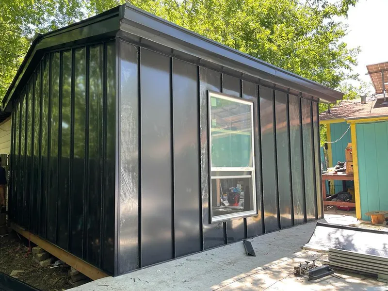 Black standing seam metal wall panels for Metal Roof Installation in East Haven